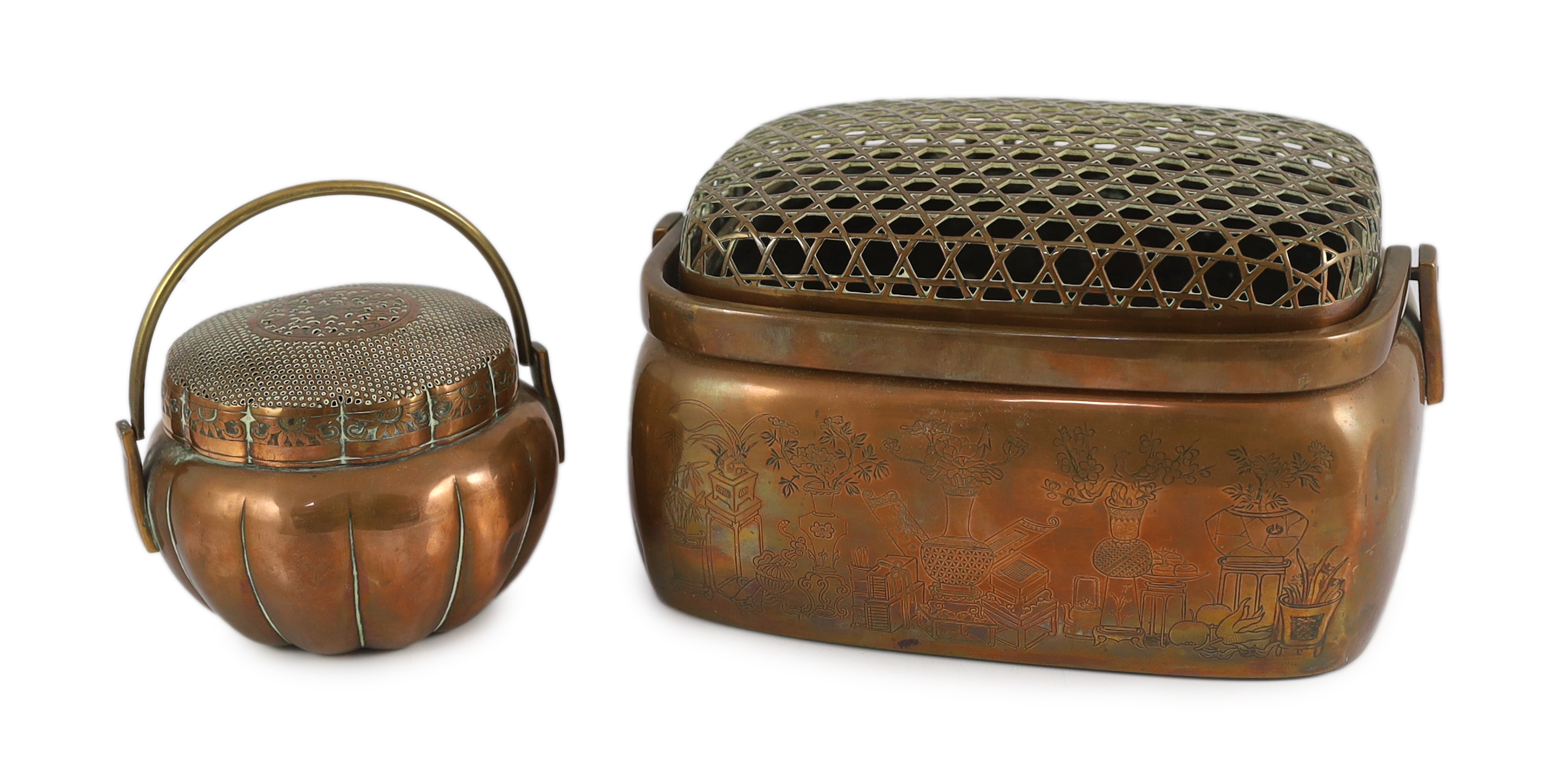 Two Chinese copper hand warmers, the largest signed ‘Zhang Mingqi', 18th/19th century